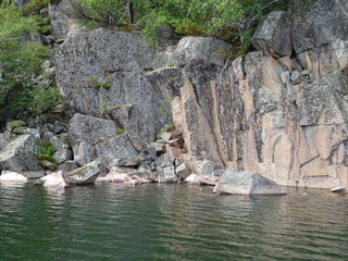 Look for petroglyphs on clean vertical rock faces